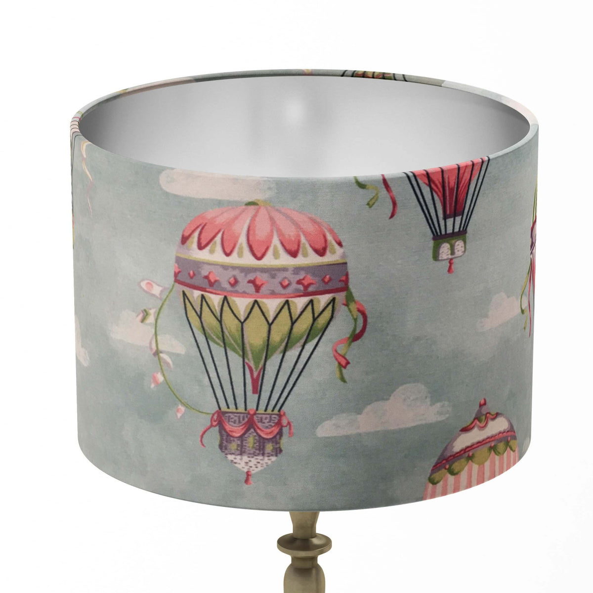 Sky blue lampshade featuring pink and green hot air balloons and white clouds on a white background.