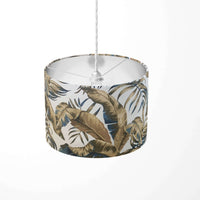 Banana leaf patterned pendant light shade on a white background.