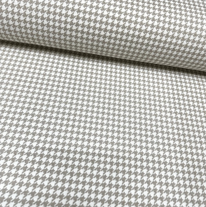 Beige and white houndstooth check fabric for upholstery curtain and home decor crafts.