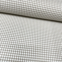 Beige and white houndstooth check fabric for upholstery curtain and home decor crafts.