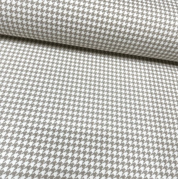 Beige and white houndstooth check fabric for upholstery curtain and home decor crafts.