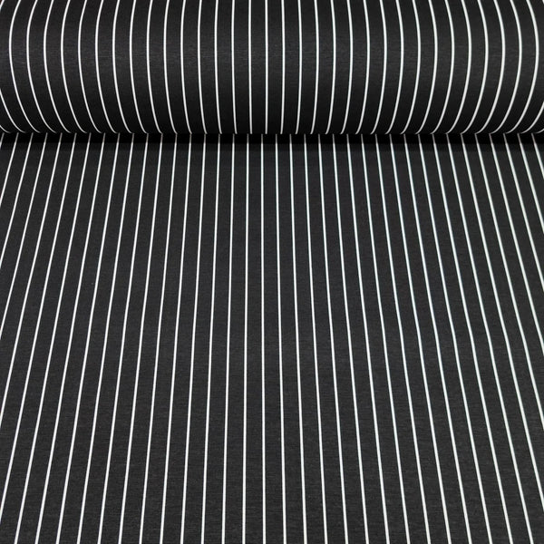 Roll of black fabric with white vertical pin stripes cotton canvas upholstery fabric