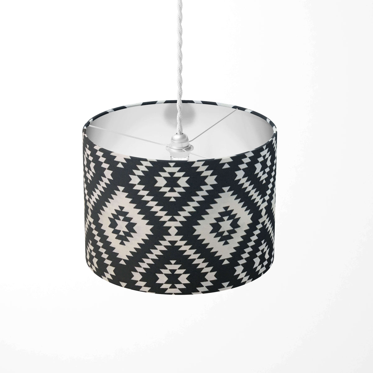 Black and white ceiling lampshade with aztec tribal pattern.