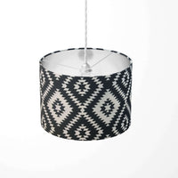 Black and white ceiling lampshade with aztec tribal pattern.