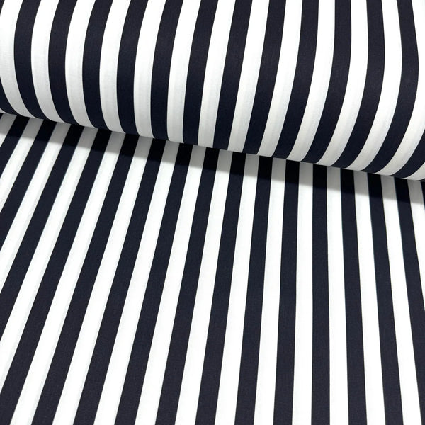 Black and white cotton stripe fabric with a classic vertical striped pattern, ideal for quilting, dressmaking, patchwork, crafts and home décor.
