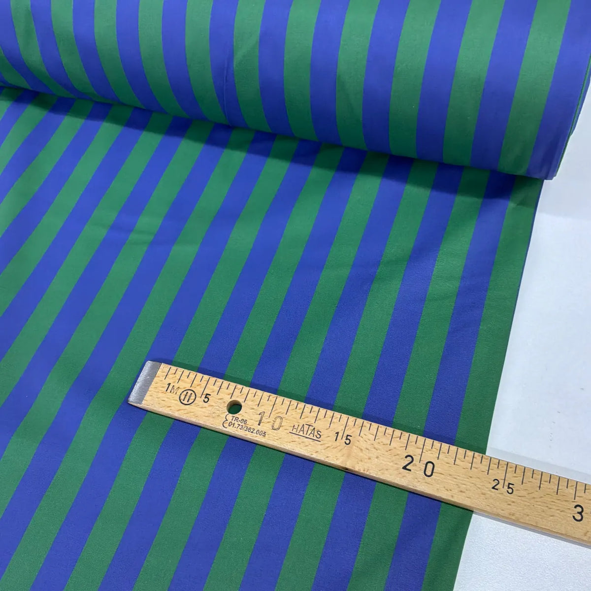 Blue and green retro stripe 100% cotton fabric featuring bold alternating stripes, ideal for dressmaking, quilting, patchwork and craft projects.