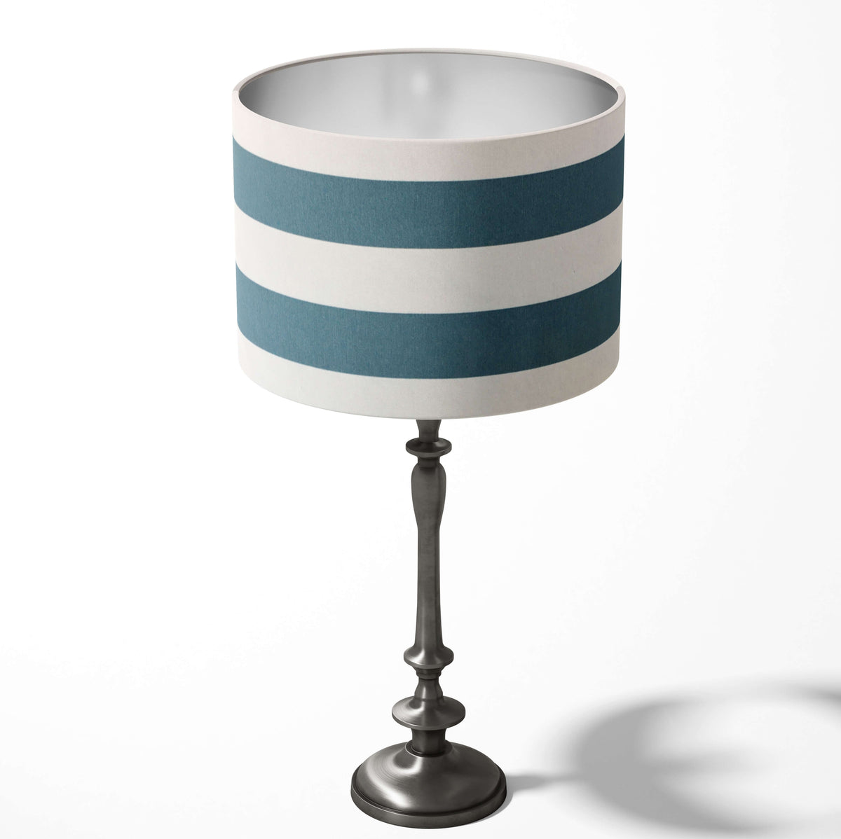 Table lampshade with horizontal teal blue and white stripes on a white background.