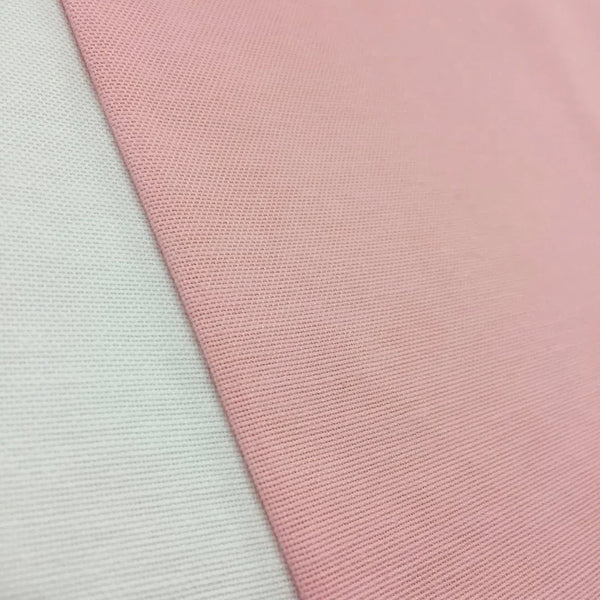 Blush pink plain cotton canvas fabric ideal for upholstery, curtains, roman blinds, cushions, chairs, sofas, and soft furnishing projects.