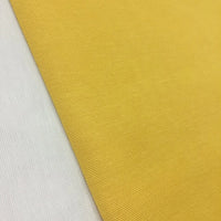 Bright yellow cotton canvas fabric with a plain texture, suitable for upholstery, curtains, cushions, bags, crafts, and light outdoor furnishing projects.