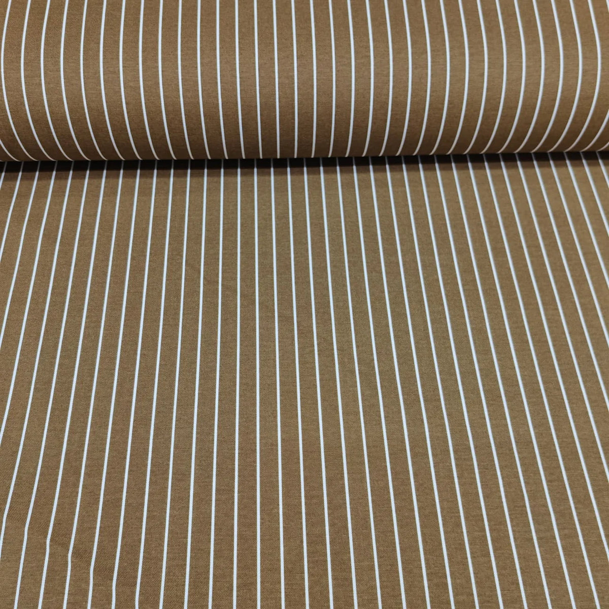 Roll of brown pinstripe cotton upholstery fabric