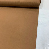 Caramel brown cotton canvas upholstery fabric ideal for curtains, cushions, furniture, indoor and outdoor projects.