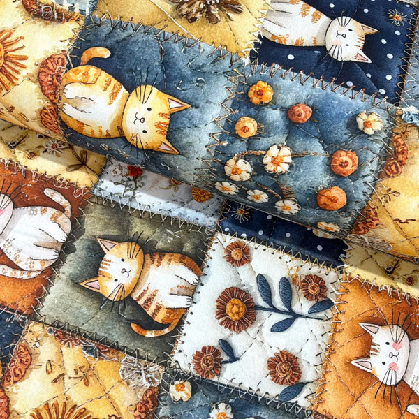 Cartoon cat 100% cotton poplin fabric featuring vintage floral patchwork squares, stitched details and cosy cottagecore colours.