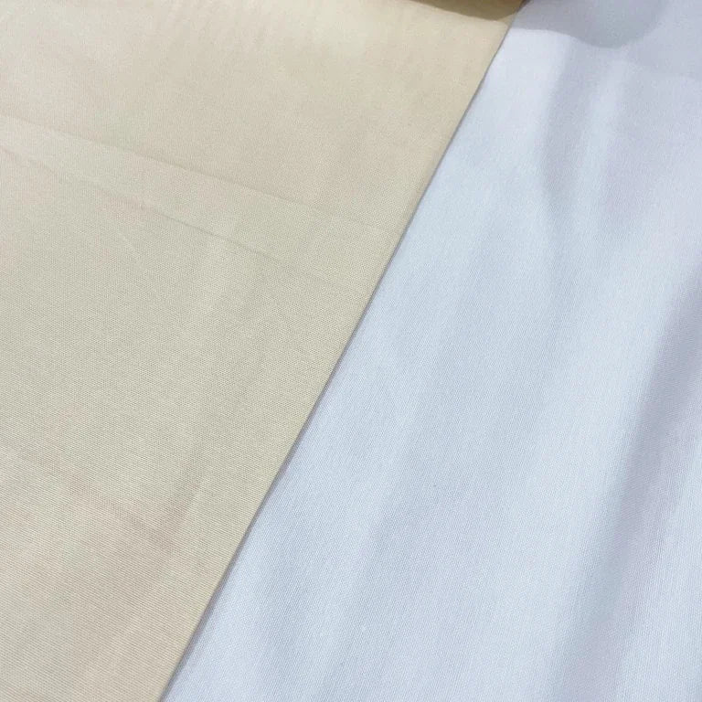 Cream natural ivory cotton canvas upholstery fabric ideal for curtains, cushions, furniture and outdoor projects.