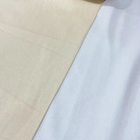 Cream natural ivory cotton canvas upholstery fabric ideal for curtains, cushions, furniture and outdoor projects.