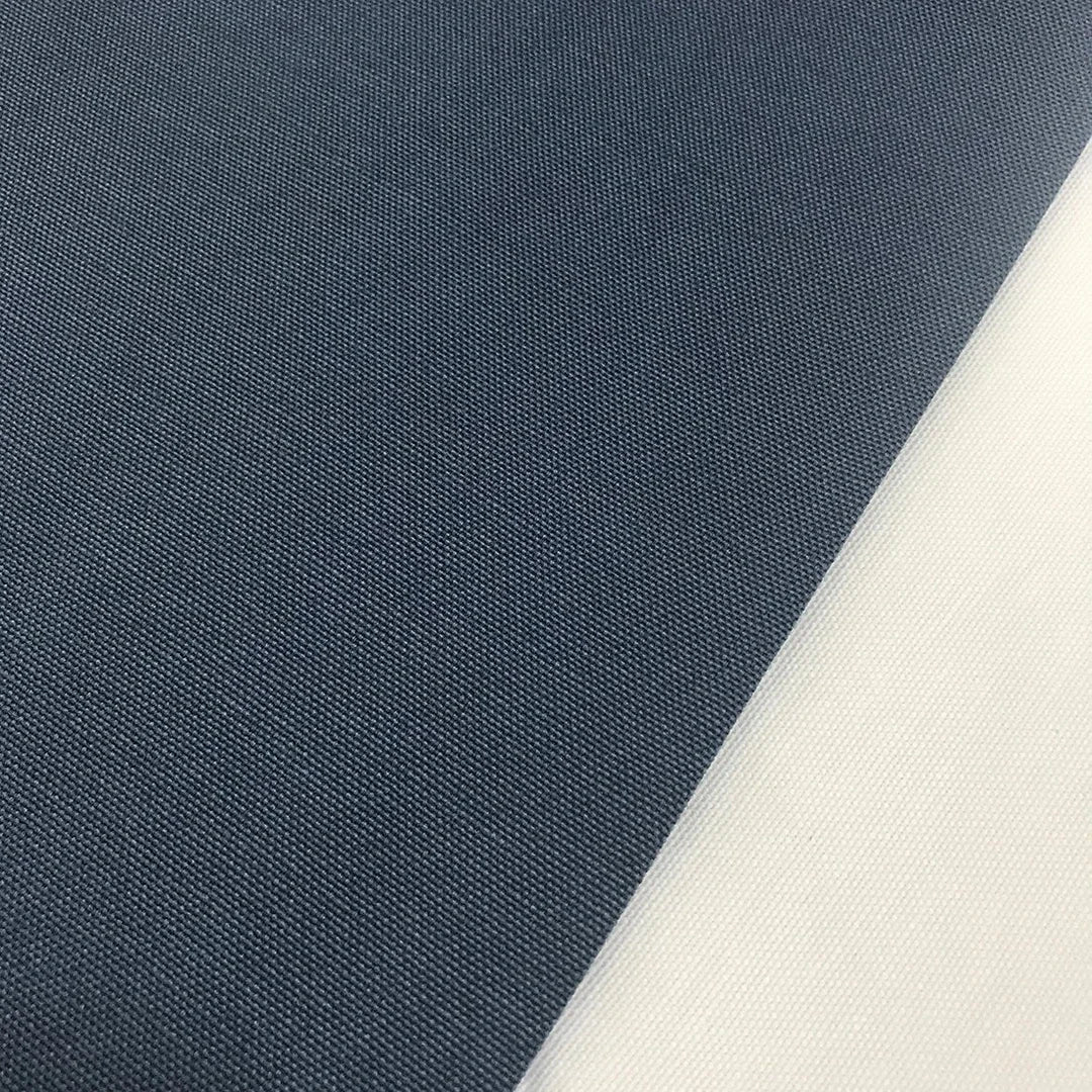 Denim blue cotton canvas fabric ideal for upholstery, curtains, cushion covers, chairs, bags and home décor projects.