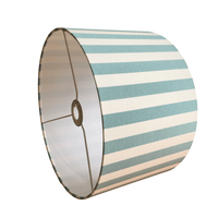 Striped lampshade with duck egg and white pattern on a white background.