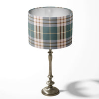 Table lampshade with a plaid check pattern in sage green, cream and brown colours.
