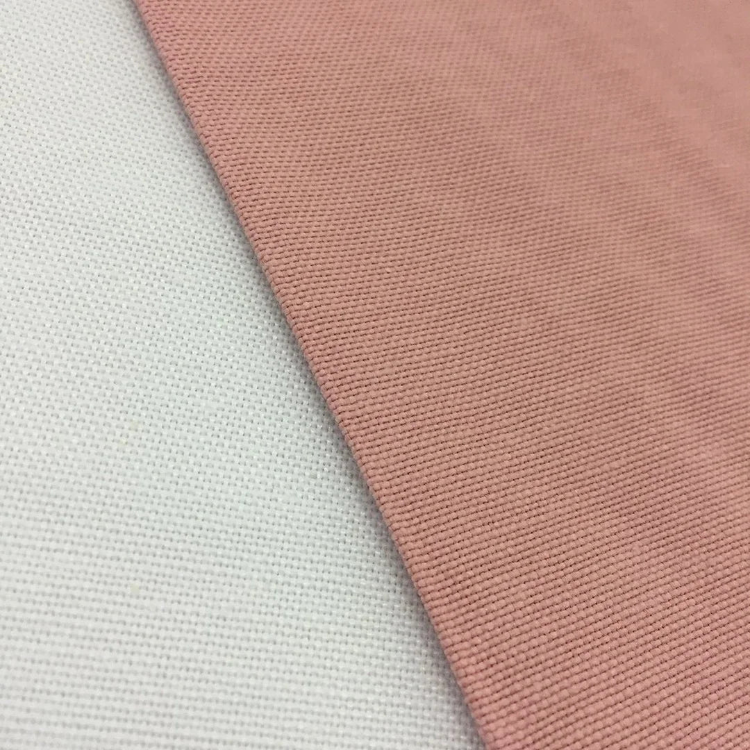 Dusty pink duck cotton canvas fabric ideal for upholstery, curtains, cushions, chair covers, home décor and sewing projects.