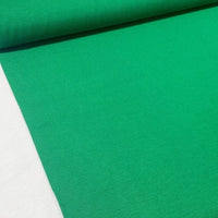 Emerald green plain cotton canvas fabric for upholstery, curtains, cushions, bags, outdoor and home décor projects.