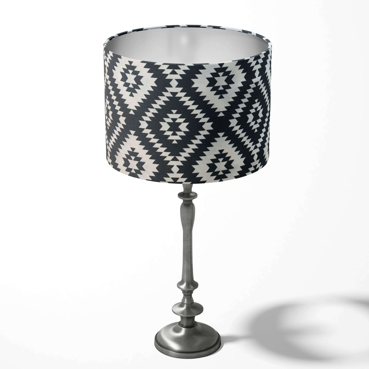 Table lampshade with a black and white geometric kilim pattern on a white background.
