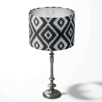 Table lampshade with a black and white geometric kilim pattern on a white background.