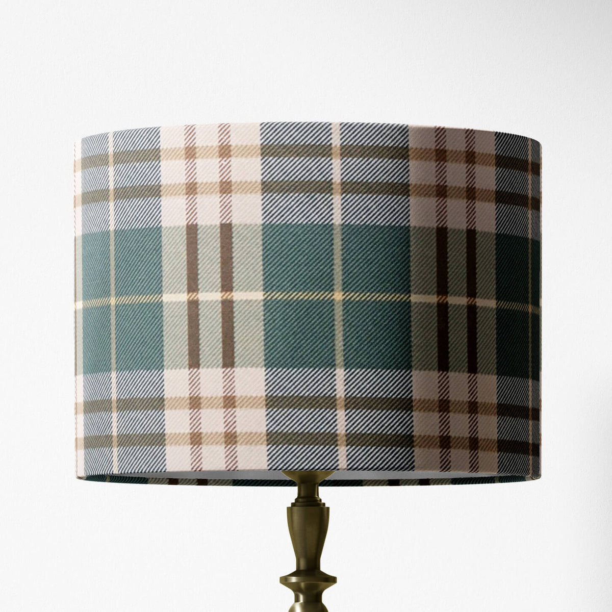 Table lamp shade with a green plaid tartan pattern on a white background.