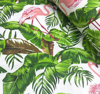 Green banana leaves and pink flamingo patterned upholstery & curtain fabric.