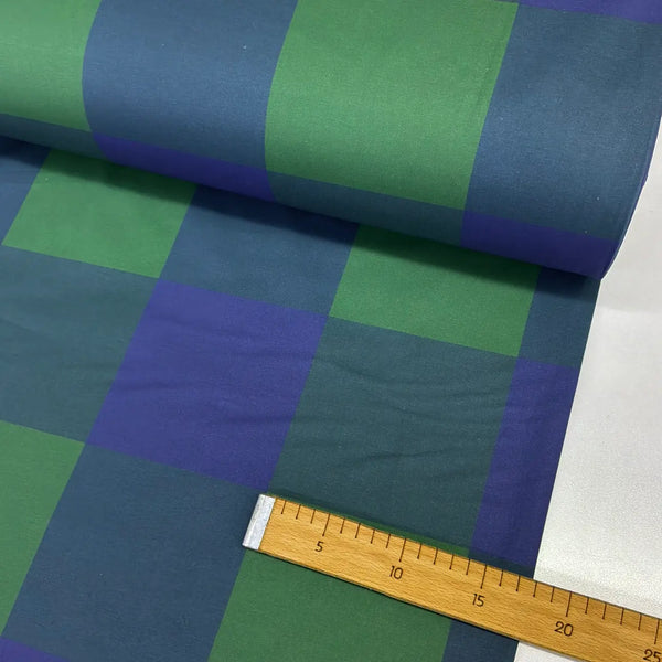 Green and navy blue large buffalo check 100% cotton fabric, ideal for quilting, patchwork, sewing, dressmaking, crafts, and home décor.