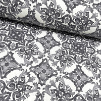 Art deco upholstery curtain fabric printed with grey white italian tiles.