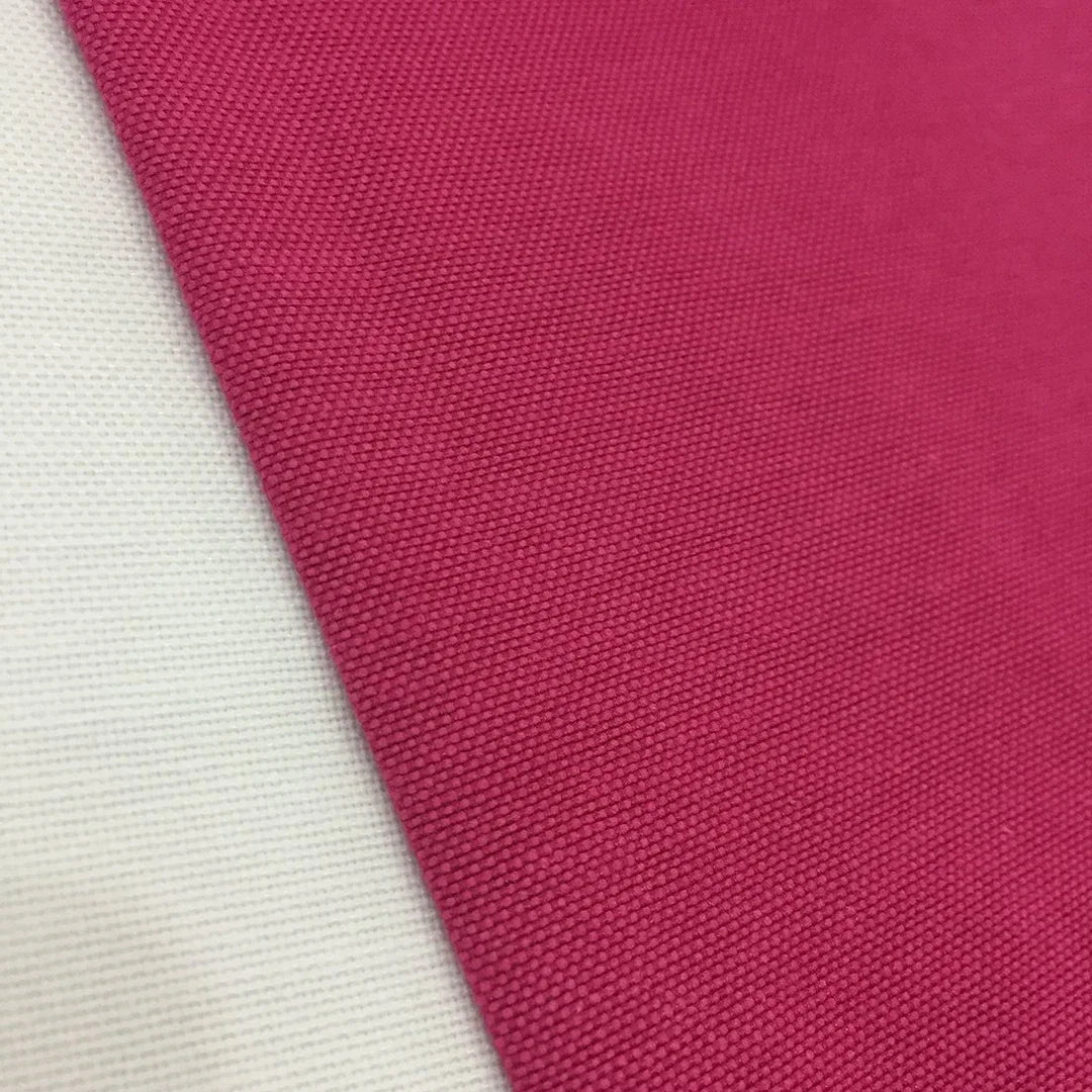 Hot pink fuchsia cotton canvas fabric ideal for upholstery, curtains, roman blinds, cushions, bags, crafts, and soft furnishing.