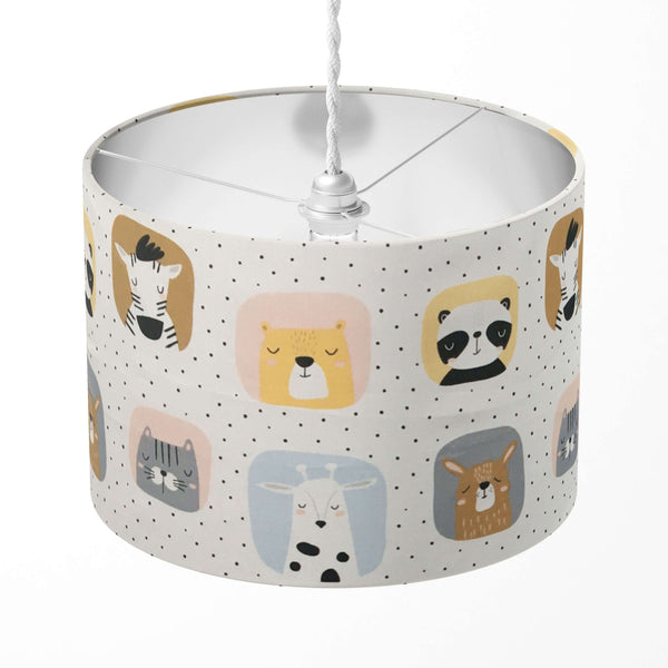 Jungle animal lampshade designed with panda, giraffe, zebra pattern.