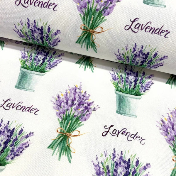 Lavender printed fabric with bouquets and lavender text on a white background.