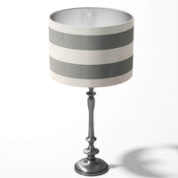 Modern striped table lampshade with gray and white horizontal stripes on a white background.