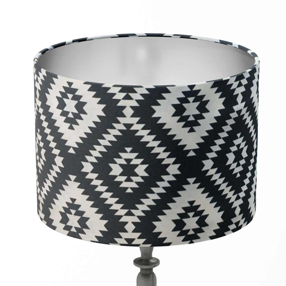 Monochrome lampshade with black and white southwestern diamond pattern on a white background.