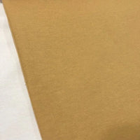 Mustard yellow cotton canvas fabric in a plain ochre yellow shade, suitable for upholstery, curtains, cushions, chairs and home decor.