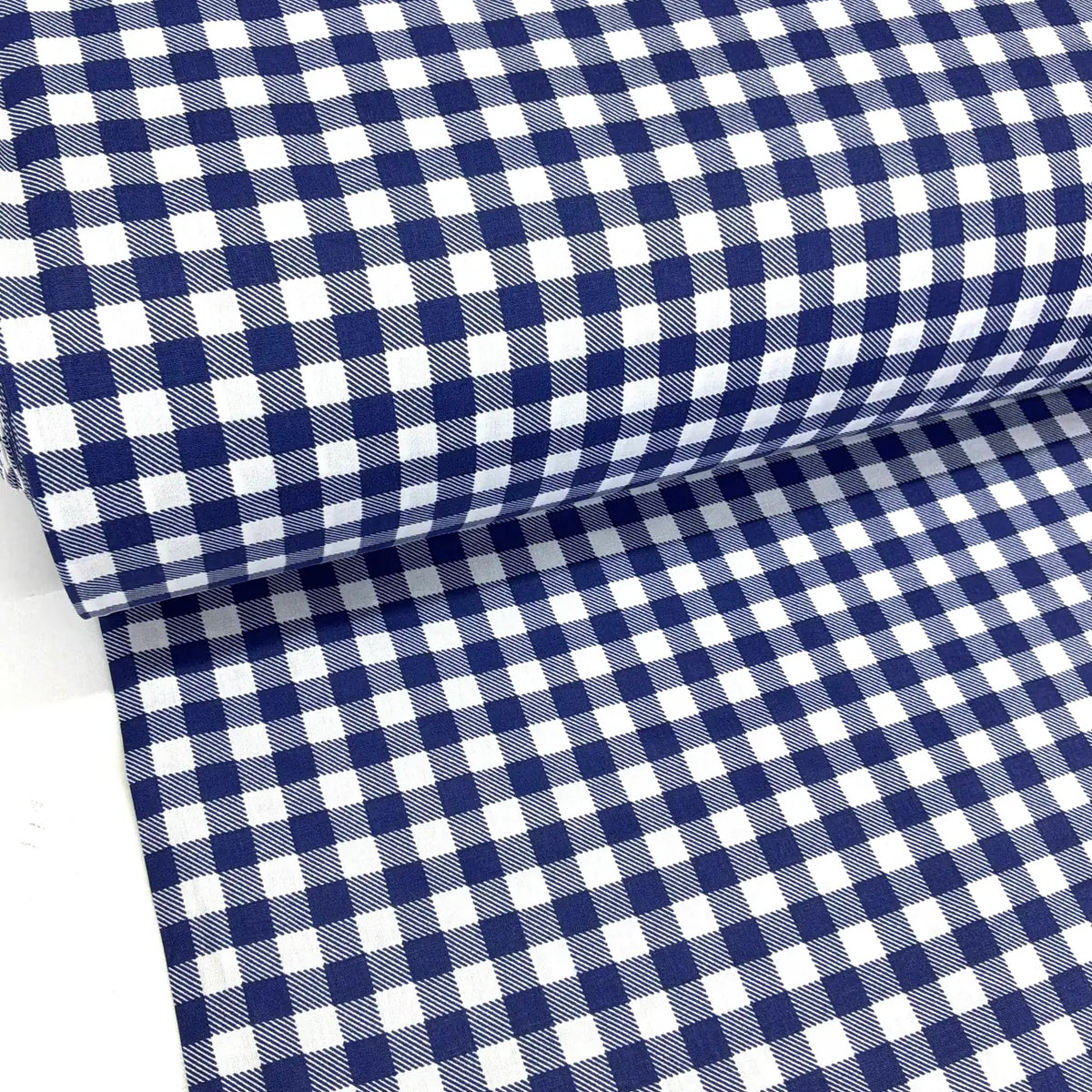 Navy blue and white gingham check 100% cotton poplin fabric for quilting, dressmaking, patchwork and craft projects.