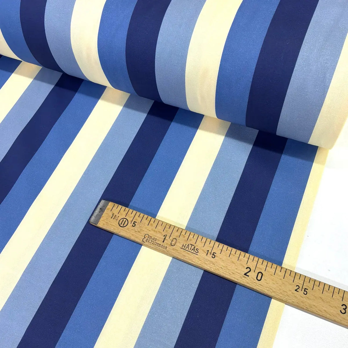 Blue, navy and white wide stripe cotton fabric ideal for dressmaking, quilting and craft projects.
