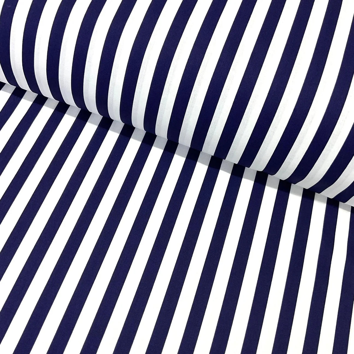 Navy and white nautical striped 100% cotton poplin fabric for quilting, dressmaking, patchwork, crafts, bags and coastal home décor.