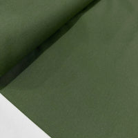 Olive green cotton canvas fabric ideal for upholstery, curtains, chair covers, cushions, bags and home décor sewing projects.