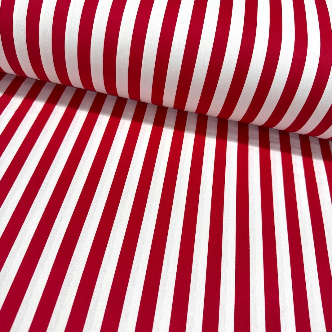Bright red and white striped 100% cotton poplin fabric with a modern stripe pattern, ideal for quilting, dressmaking, patchwork, crafts and home décor.