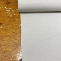 Silver grey upholstery fabric with a plain finish, suitable for curtains, outdoor cushions, garden furniture and home decor projects.