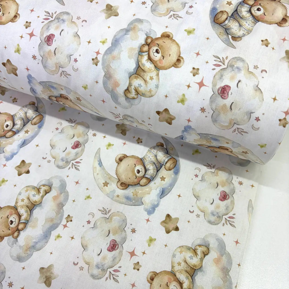 Sleepy teddy bear 100% cotton poplin fabric featuring teddy bears on crescent moons and fluffy clouds with stars on a white background.