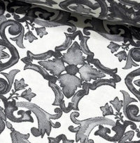 Close up of a grey and white majolica fabric.
