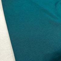 Teal cotton canvas fabric in a plain peacock blue shade, perfect for upholstery, curtains, cushions sofas and chairs.