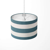 Striped ceiling lampshade with petrol blue and white stripes on a white background.