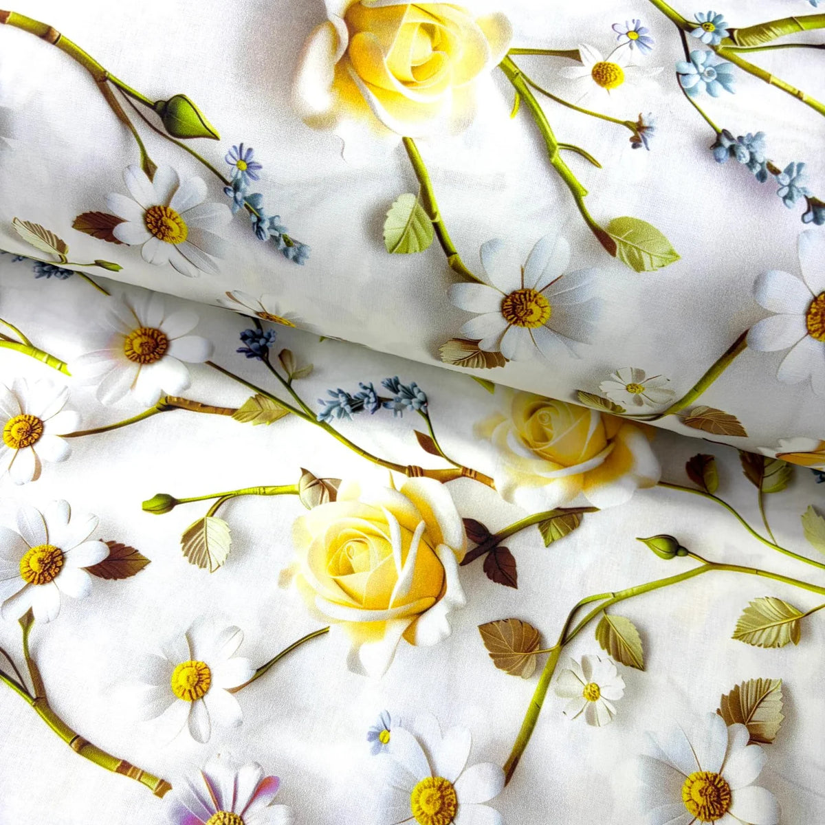 White cotton poplin fabric printed with a floral pattern featuring yellow roses, white daisies with yellow centers, and small blue flowers with green stems.