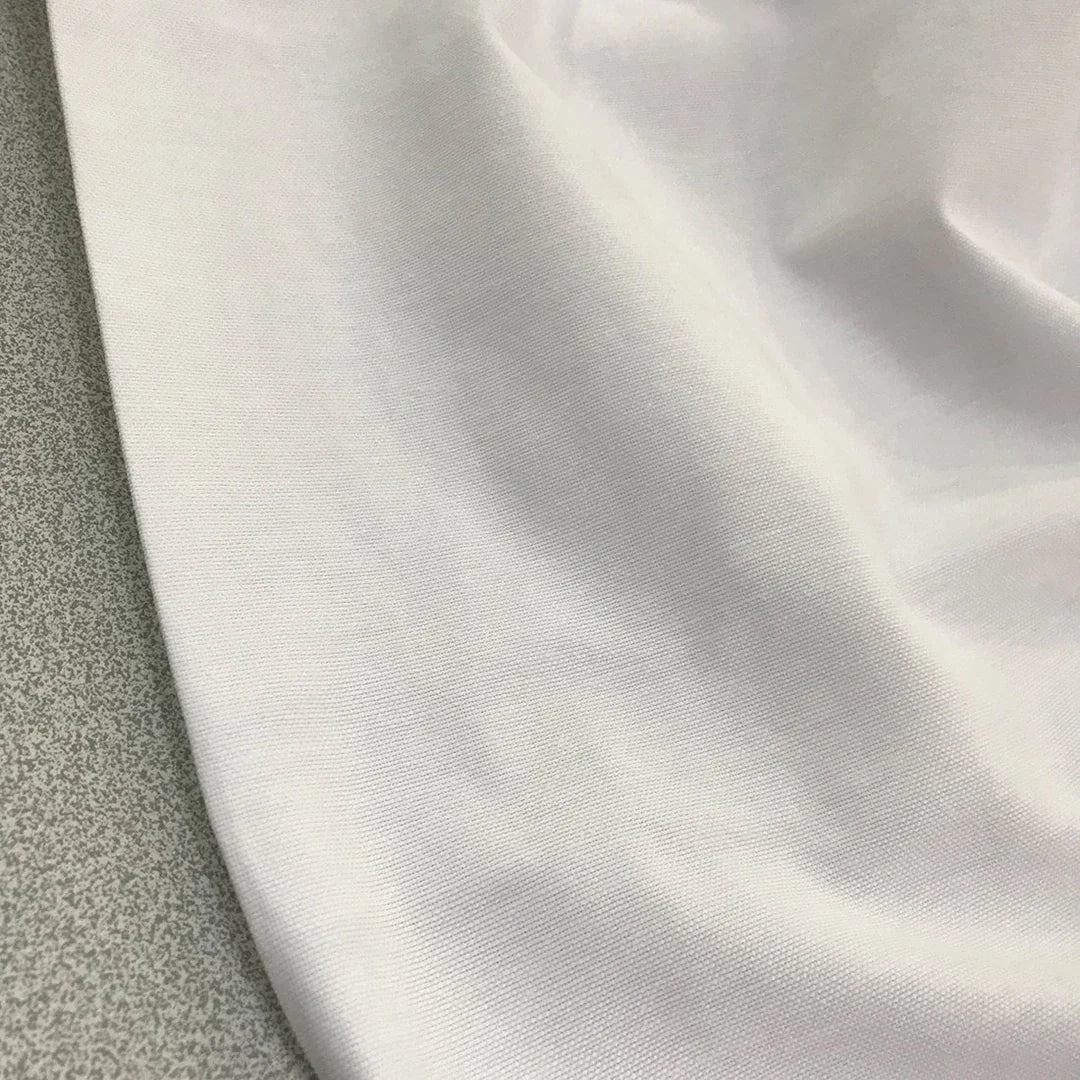 White plain cotton canvas fabric ideal for upholstery, curtains, cushion covers, chairs, bags and home décor projects.