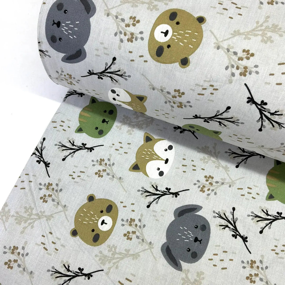 100% cotton poplin fabric with woodland animal pattern including bears, foxes, cats and rabbits on a light grey background.
