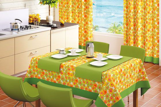 A vibrant dining kitchen featuring matching floral curtain fabric