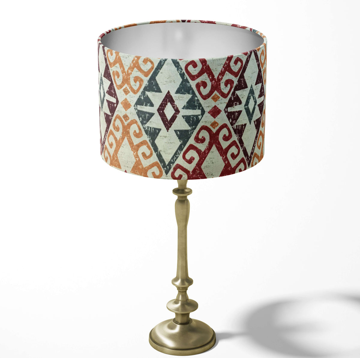 Table lampshade with an aztec kilim pattern on a white background.